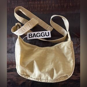 BAGGU Small Nylon Crescent Bag in Butter Color.
